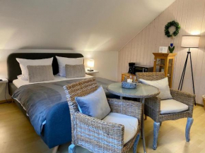 Haus Im Arnikagrund - Ferienwohnung & Privatzimmer
